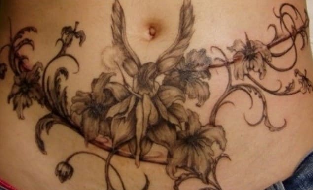 tatuajes en el abdomen de hada mujer